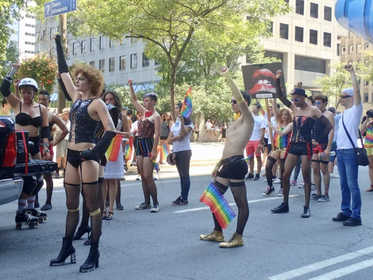 Marchers in corsets and fishnets during Montreal Pride.