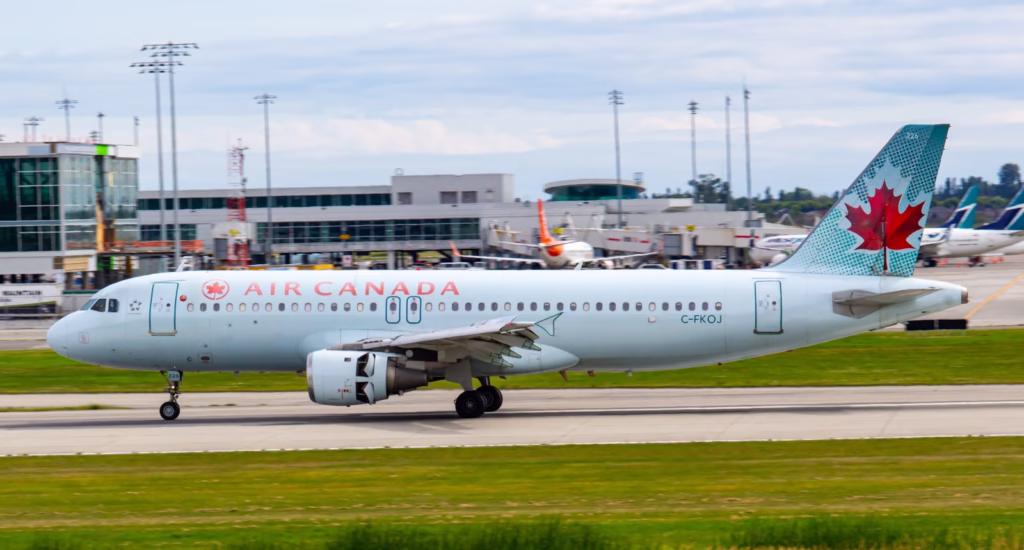 Air Canada plane on tarmac during daytime