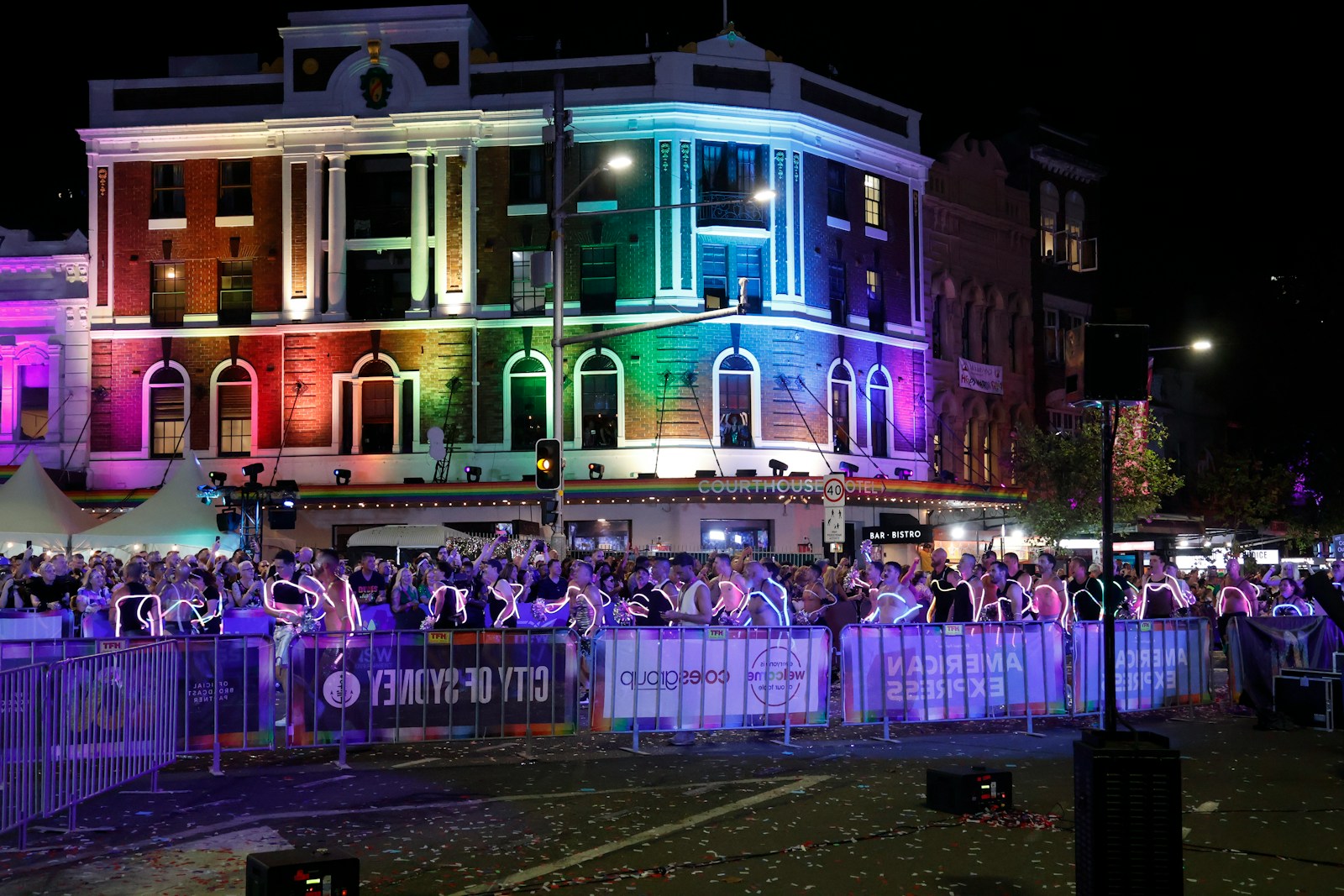 Gay friendly city bar lit up with rainbow lighting 